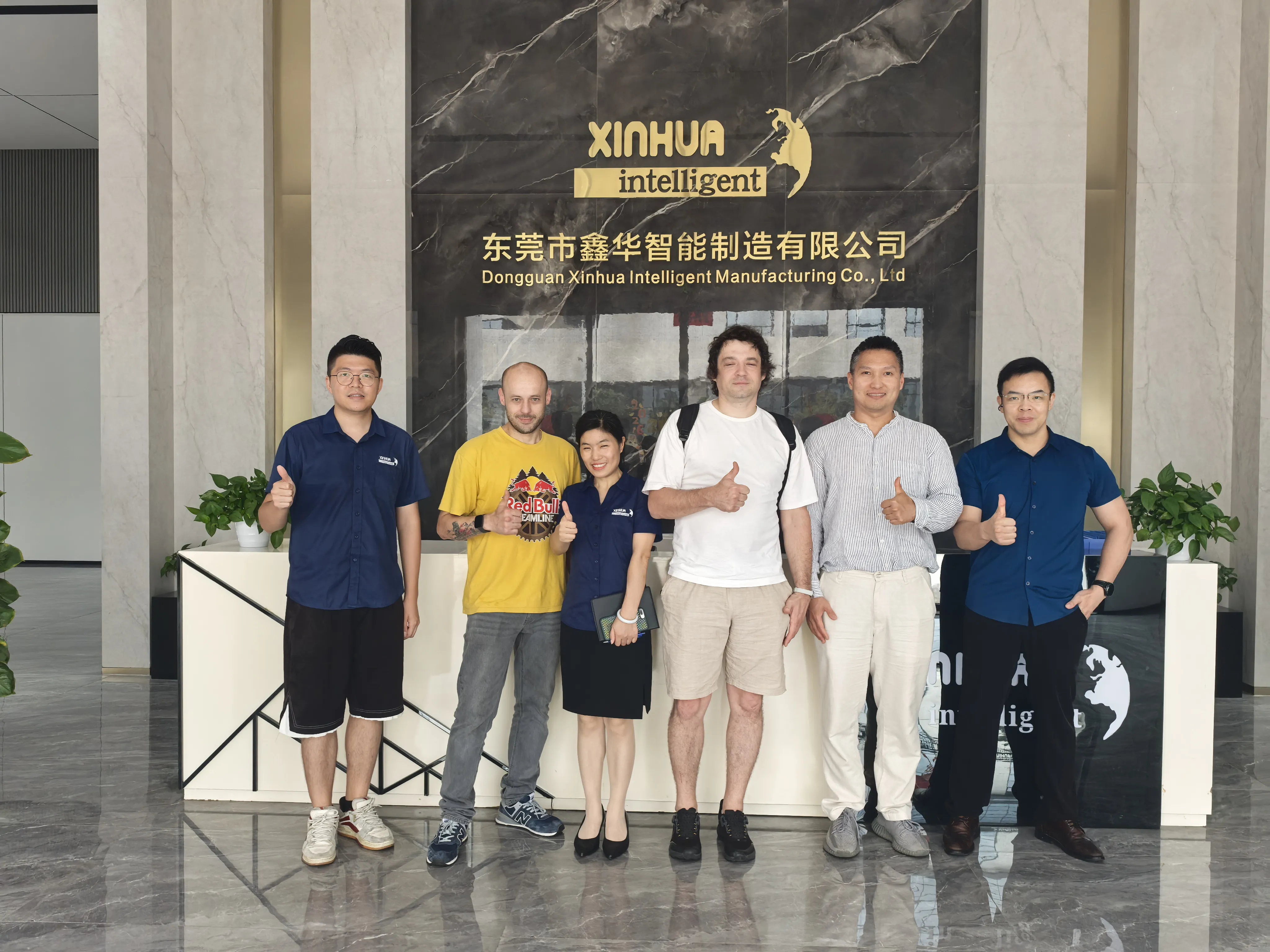 Kazakhstan customer visits Xinhua factory to inspect automatic screwdriver goods.